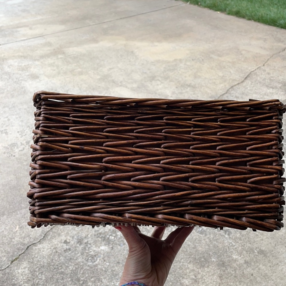 Brown basket with liner inside. 100% polyester.